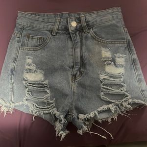 Light blue Xs shorts.